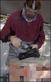 Skandar sculpting obsidian in Bishop, Ca. Eastern Sierra Nevada